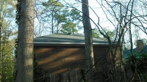 Installed designer carriage house shingles in stonegate grey shingles made by CertainTeed